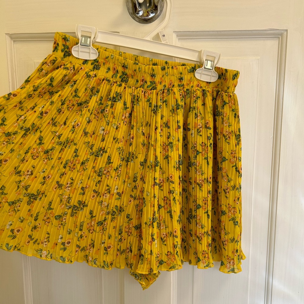 Bright yellow, floral printed flowy shorts, fashionable, flexible waistband